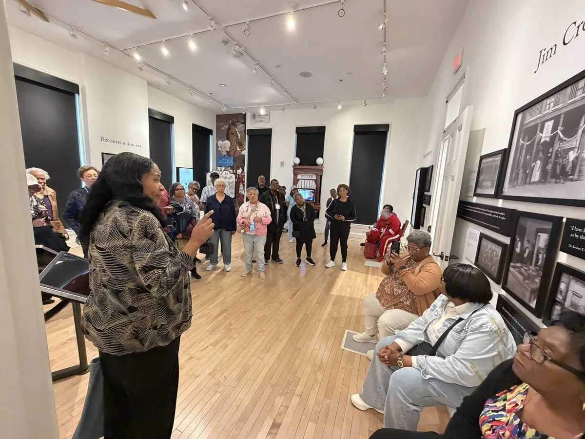 Adult learners gathered casually and enjoying one another's company